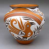 A polychrome jar decorated with a two-panel parrot, plant, flower, rainbow and geometric design
 by Loretta Joe of Acoma