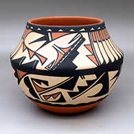 A polychrome jar decorated with a feather and geometric design
 by Carmelita Dunlap of San Ildefonso