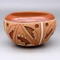 A polychrome Potsuwii-style jar decorated with a four-panel painted and carved kiva step and geometric design around the body
 by Rosita de Herrera of Ohkay Owingeh