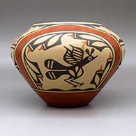 A polychrome jar decorated with a four-panel roadrunner, butterfly, rainbow,cloud formation and geometric design, click or tap to see a larger version