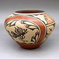A polychrome jar decorated with a four-panel roadrunner, butterfly, rainbow,cloud formation and geometric design
 by Ruby Panana of Zia