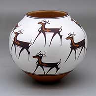 A polychrome jar decorated with a deer-with-heart-line design
 by Anderson Peynetsa of Zuni