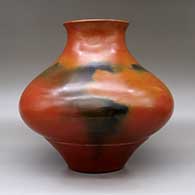 A brown jar with a recurved rim and fire clouds, click or tap to see a larger version