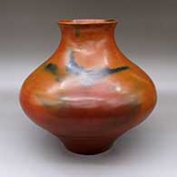 A brown jar with a recurved rim and fire clouds
 by Samuel Manymules of Dineh