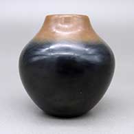 Small polished black jar with a sienna rim, click or tap to see a larger version