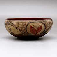 A polychrome chili bowl polished inside and decorated with a six panel leaf, fineline and geometric design, click or tap to see a larger version