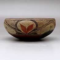 A polychrome chili bowl polished inside and decorated with a six panel leaf, fineline and geometric design, click or tap to see a larger version