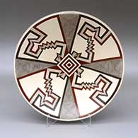 Polychrome plate with a fine line and geometric design
 by Cruz Renteria Heras of Mata Ortiz and Casas Grandes