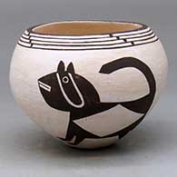 A black on white jar decorated with a two-panel Mimbres-style animal and geometric design
 by Carmel Lewis of Acoma