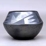 A black on gunmetal black jar decorated with a four-panel bat wing and geometric design above the shoulder, click or tap to see a larger version
