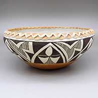 Polychrome bowl with a pie crust rim and a fine line and geometric design
 by Unknown of Acoma