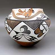 Polychrome jar with a traditional Acoma design featuring parrot, fine line, and geometric elements, click or tap to see a larger version
