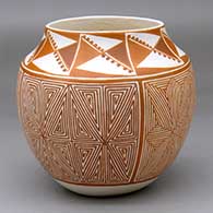 A red-on-white jar decorated with a four-panel butterfly fine line and snowflake fine line geometric design
 by Adrian Trujillo of Acoma