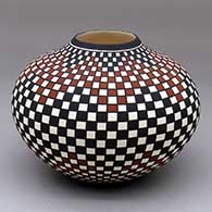A polychrome jar with a raised opening and a checkerboard geometric design
 by Paula Estevan of Acoma
