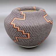 A polychrome Infinity pot decorated with a four-panel geometric design
 by Frederica Antonio of Acoma