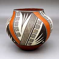 A polychrome jar decorated with a four-panel scroll, fine line, bat wing and geometric design
 by Unknown of Acoma