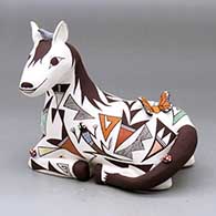 A polychrome horse figure decorated with a lizard, butterfly, lady bug and geometric design with appliques
 by Judy Lewis of Acoma