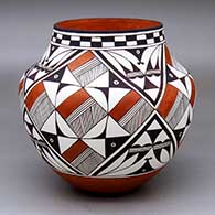 A polychrome jar decorated with a four-panel fine line, checkerboard, bird element, cloud formation and geometric design
 by TobieMae Patricio of Acoma