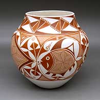 A polychrome jar decorated with a four-panel snowflake fine line, Mimbres fish, medallion and geometric design
 by Adrian Trujillo of Acoma