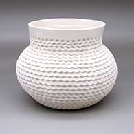 A corrugated white jar
 by Jackie Shutiva of Acoma