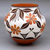 A polychrome jar decorated with a four-panel flower, vine and geometric design
 by Felisha Patricio of Acoma