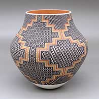 A polychrome jar decorated with a tiny checkerboard and geometric design
 by Frederica Antonio of Acoma