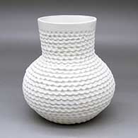 A tall-neck corrugated white jar
 by Jackie Shutiva of Acoma