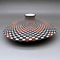 A wide low-shouldered polychrome jar decorated with a checkerboard geometric design
 by Paula Estevan of Acoma