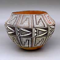 A polychrome jar decorated around the body with a ten-panel geometric design
 by Unknown of Acoma