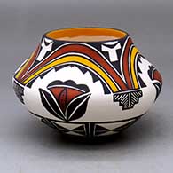 A polychrome jar decorated with a four-panel rainbow, flower and geometric design
 by Sandra Victorino of Acoma