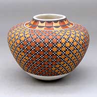 A high-shouldered polychrome jar decorated with a checkerboard and geometric design
 by Frederica Antonio of Acoma