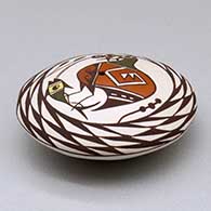 A polychrome seed pot decorated above the shoulder with a cloudeater, fish and spiral mesa geometric design, click or tap to see a larger version