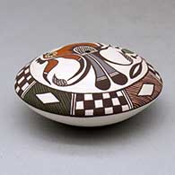 A polychrome seed pot decorated above the shoulder with a parrot, plant, checkerboard, fineline and geometric design, click or tap to see a larger version