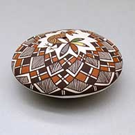 A polychrome seed pot decorated above the shoulder with a bird, fineline and geometric design, click or tap to see a larger version