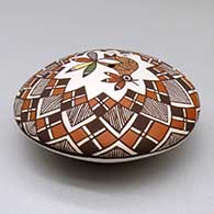 A polychrome seed pot decorated above the shoulder with a bird, fineline and geometric design, click or tap to see a larger version