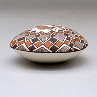 A polychrome seed pot decorated above the shoulder with a bird, fineline and geometric design, click or tap to see a larger version