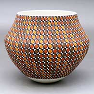 A polychrome jar decorated with a checkerboard and geometric design
 by Frederica Antonio of Acoma