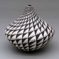 A polychrome tear drop jar decorated with a spiral mesa and snowflakes geometric design
 by Sandra Victorino of Acoma