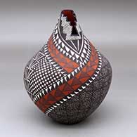 A polychrome tear drop jar with a kiva step cut opening and decorated with a checkerboard, fine line and geometric design
 by Sandra Victorino of Acoma