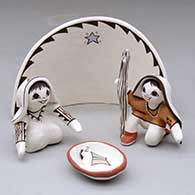 A four-piece polychrome Nativity set
 by Judy Lewis of Acoma