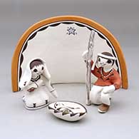 A four-piece polychrome Nativity set
 by Judy Lewis of Acoma