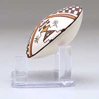 A miniature polychrome seed pot decorated with a pueblo dancer, checkerboard and geometric design above the shoulder, click or tap to see a larger version