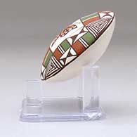 A miniature polychrome seed pot decorated with a butterfly and geometric design above the shoulder, click or tap to see a larger version