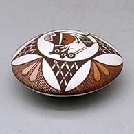 A polychrome seed pot decorated above the shoulder with a cloudeater, fish, fineline and geometric design, click or tap to see a larger version