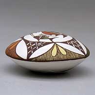 A polychrome seed pot decorated above the shoulder with a cloudeater, fish, fineline and geometric design, click or tap to see a larger version