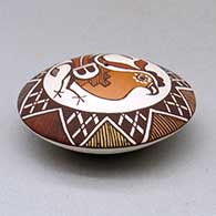 A polychrome seed pot decorated above the shoulder with a parrot, fineline and geometric design, click or tap to see a larger version