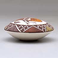 A polychrome seed pot decorated above the shoulder with a parrot, fineline and geometric design, click or tap to see a larger version