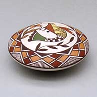 A polychrome seed pot decorated above the shoulder with a hummingbird, flower and geometric design, click or tap to see a larger version