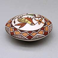 A polychrome seed pot decorated above the shoulder with a hummingbird, flower and geometric design, click or tap to see a larger version