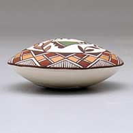 A polychrome seed pot decorated above the shoulder with a hummingbird, flower and geometric design, click or tap to see a larger version